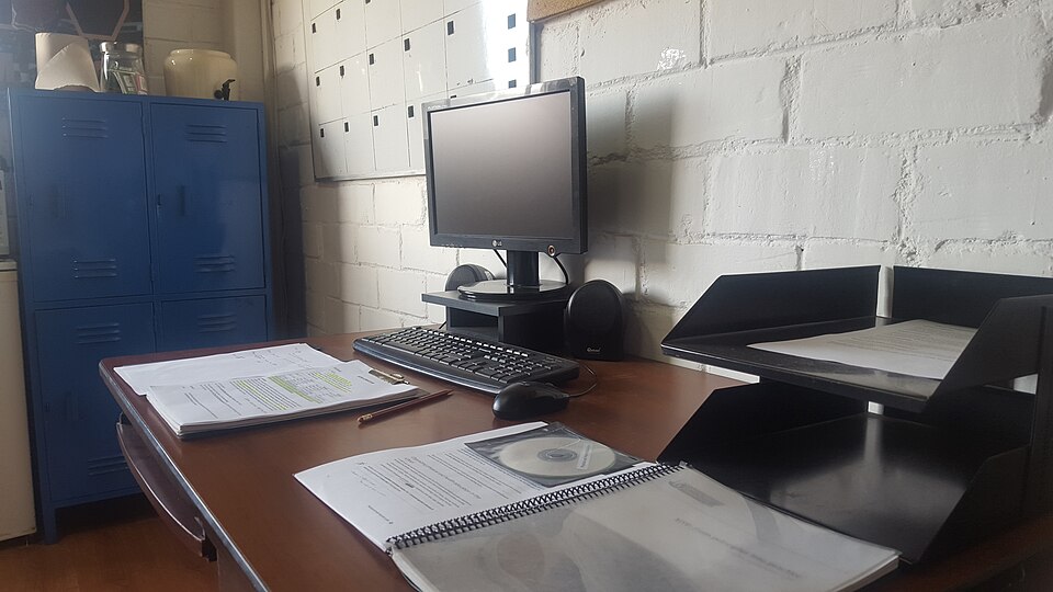 Office computer and documents representative image for AI study review